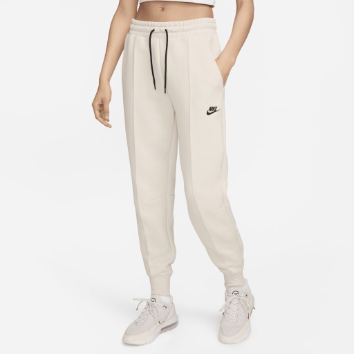 Nike Tech Fleece joggingbroek met halfhoge taille voor dames - Bruin